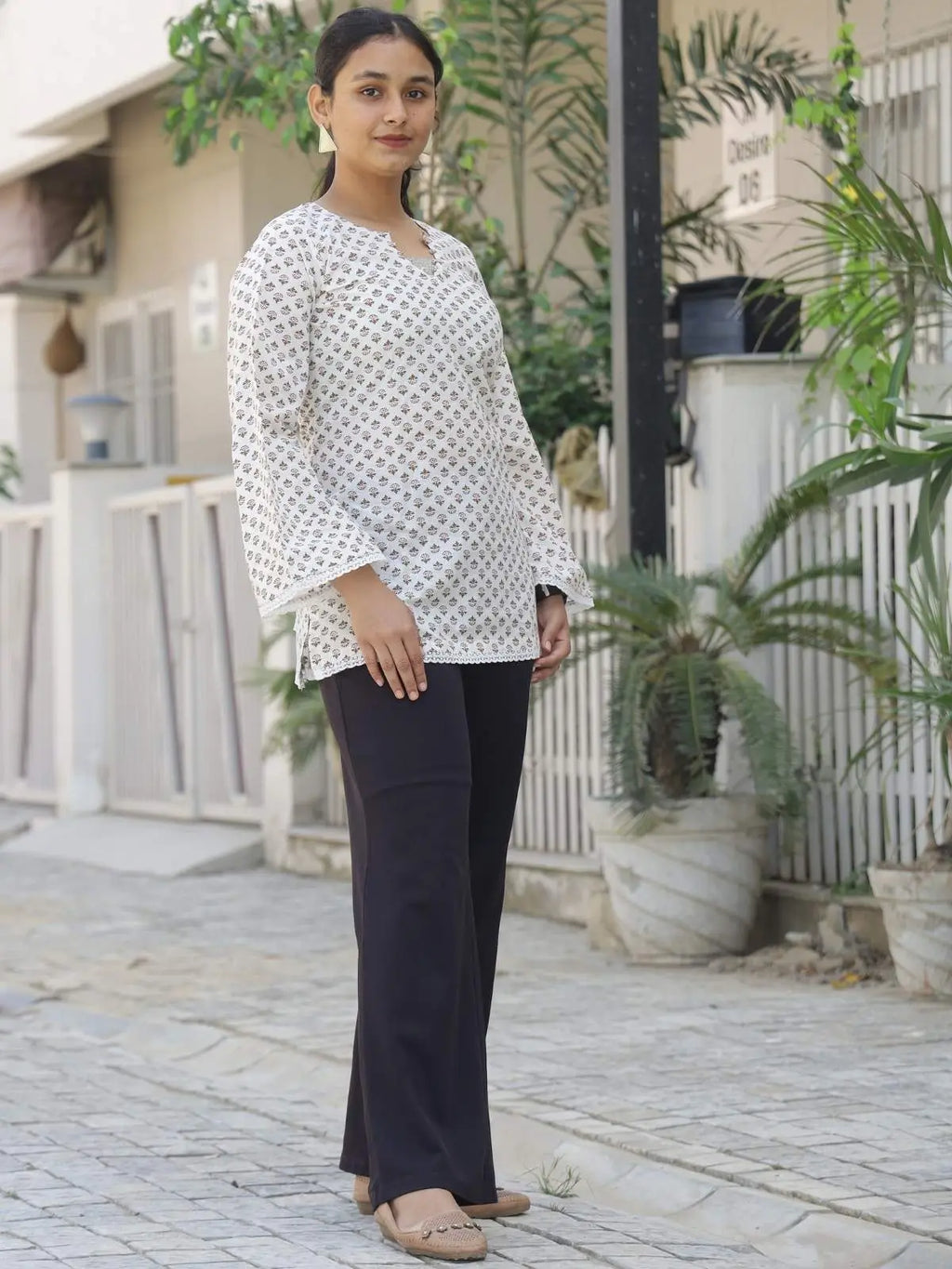 White and maroon lace detail short kurti - right side view